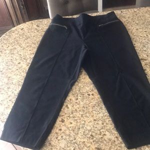 Black capris with zipper pockets